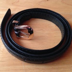 Black patent pleather skinny belt with gold buckle